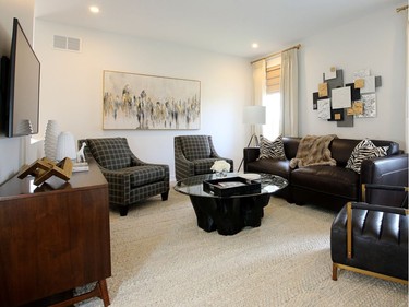 A second-floor TV room offers a comfortable lounging area for the kids. Julie Oliver/Postmedia