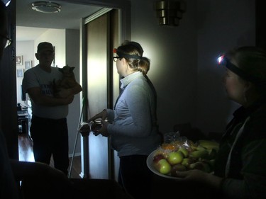 - Wearing a headlamp in the pitch-black halls of a seniors residence on Bateman Drive in Nepean, McConnell (left) and Raymond knock on doors to give the elderly muffins, fruit and comfort Monday morning.  The residence there, made up of about 70 people over four floors remained without power Monday. Amy McConnell, along with Pierrette Raymond and countless others, marshalled an army of volunteers through social media and jumped into action to help seniors in the Ottawa stranded without power from the tornado.  For the past four days dozens of them spread out to affected high rises and humped food and water up countless flights of stairs. offering comfort to many seniors left in the dark.   Julie Oliver/Postmedia