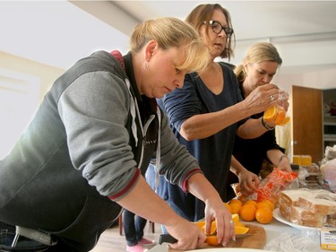 - Pierrette Raymond (left) whips up sandwiches and fruit plates in the common room before knocking on doors in the darkened hallways of a seniors' residence.  Amy McConnell, along with Pierrette Raymond and countless others, marshalled an army of volunteers through social media and jumped into action to help seniors in the Ottawa stranded without power from the tornado.  For the past four days dozens of them spread out to affected high rises and humped food and water up countless flights of stairs. offering comfort to many seniors left in the dark.   Julie Oliver/Postmedia