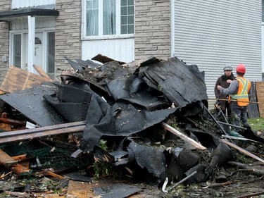 Demolition started in the Mont-Bleu area of Gatineau Tuesday following the tornado that ripped through the housing development Friday. People could be found gathering up what little they could find in the remains of their homes as crews worked to demolish unsafe buildings and clean up debris.  Julie Oliver/Postmedia