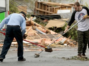 Demolition and cleanup continued Wednesday in the Mont-Bleu area of Gatineau as residents hard hit by last Friday's tornado salvaged what they could from their homes and workers started repairing roofs, continued hydro line repairs and clearing trees and debris.