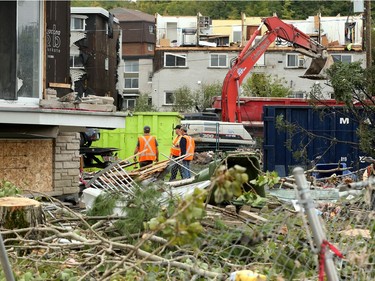 Demolition and cleanup continued Wednesday in the Mont-Bleu area of Gatineau as residents hard hit by last Friday's tornado salvaged what they could from their homes and workers started repairing roofs, continued hydro line repairs and clearing trees and debris.