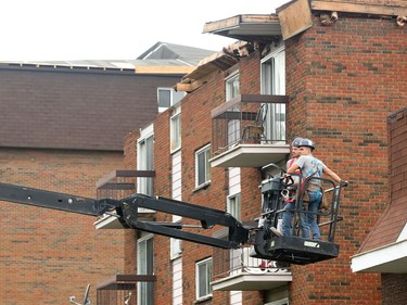 Demolition and cleanup continued Wednesday in the Mont-Bleu area of Gatineau as residents hard hit by last Friday's tornado salvaged what they could from their homes and workers started repairing roofs, continued hydro line repairs and clearing trees and debris.