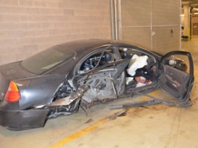 A man allegedly wrecked this vehicle in Kingston early Wednesday, then fled on a bicycle, then fought with police when he was arrested.