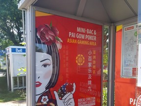 An Ottawa bus shelter features a casino ad appealing to East Asians.