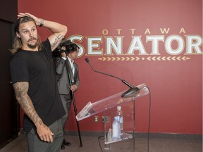 Erik Karlsson prepares to speak to the media at the Canadian Tire Centre after he was traded from the Ottawa Senators to the San Jose Sharks on Thursday, Sept. 13, 2018.