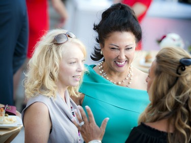 From left, Peggy Taillon, president of the Bruyère Foundation, chats with Jamilah Taib Murray, chair of Sakto Corporation, and Michelle Begin, owner of Valley Flowers.