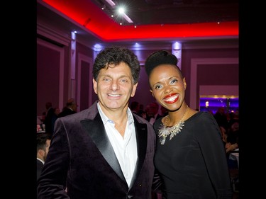 Gala auctioneer Lawrence Greenspon with Juno Award-winning singer Kellylee Evans, the evening's host.