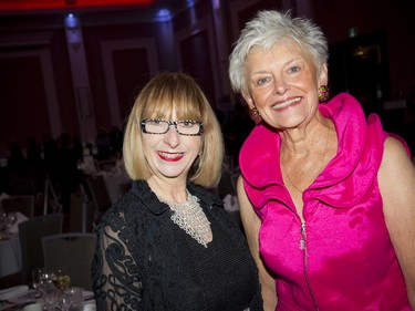 Arlene Hobin, owner of House of Fashion, along with Carol Lange, wearing one of Hobin's beautifully coloured designs.