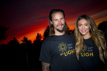 Melinda and husband Erik Karlsson took a moment for a photo at the end of the walk at the Can’t Dim My Light event.