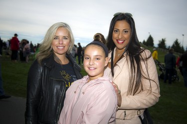 Sarah Grand, a Can’t Dim My Light committee member, MJ Naim Brown and her daughter 12-year-old Mathilda-Jolie Brown.