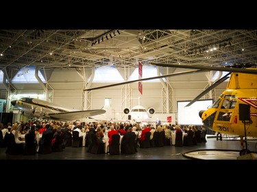 The crowd sitting down for dinner at the Canada Aviation and Space Museum during the Veterans' Gala.