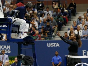 Serena Williams of the US argues with chair umpire Carlos Ramos while playing Naomi Osaka of Japan during their 2018 US Open women's singles final match on September 8, 2018 in New York. - Osaka, 20, triumphed 6-2, 6-4 in the match marred by Williams's second set outburst, the American enraged by umpire Carlos Ramos's warning for receiving coaching from her box. She tearfully accused him of being a "thief" and demanded an apology from the official.