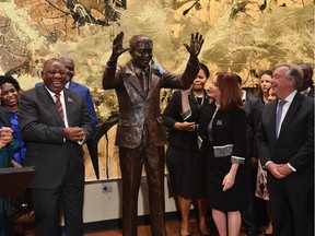 South Africa's President Cyril Ramaphosa, UN General Assembly President Maria Fernanda Espinosa and Secretary-General of the United Nations Antonio Guterres attend the unveiling ceremony of the Nelson Mandela Statue from the Republic of South Africa on September 24, 2018 at the United Nations in New York.