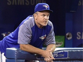Manager of the Toronto Blue Jays John Gibbons looks on from the dugout as his team plays the Cleveland Indians during seventh inning American League baseball action in Toronto, Friday, Sept.7, 2018. Manager John Gibbons will not return to the Toronto Blue Jays in 2019, ending his second run with the club.