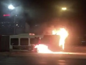 Passengers had to flee a flaming OC Transpo bus in the city's east end Monday night and the driver who ordered them off was taken to the hospital after inhaling smoke. (courtesy of Kayla Madere)