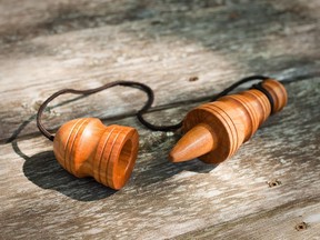 This child's toy is called a capirucho and is a popular in South and Central America. Steve turned it from some scrap tropical hardwood deck lumber.