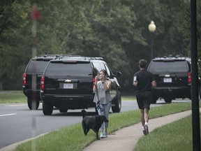 President Donald Trump's motorcade arrives at his golf course in Sterling, Va., Saturday, Sept. 1, 2018.