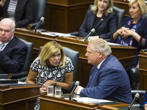 Ontario Premier Doug Ford and Deputy Premier Christine Elliott during a rare Saturday session of the Legislative Assembly of Ontario at Queen's Park in Toronto, Ont. on Saturday September 15, 2018.