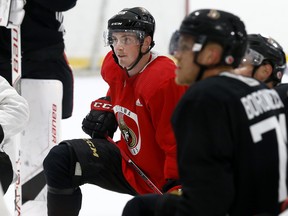 Ottawa Senators Matt Duchene (left) takes a knee during training camp at the Canadian Tire Centre yesterday. (Tony Caldwell/Ottawa Sun)