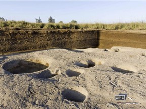This undated photo released by the Egyptian Ministry of Antiquities, shows one of the oldest villages ever found in the Nile Delta, with remains dating back to before the pharaohs in Tell el-Samara, about 140 kilometers (87 miles) north of Cairo, Egypt. Chief archaeologist Frederic Gio says his team found silos containing animal bones and food, indicating human habitation as early as 5,000 B.C. (Egyptian Ministry of Antiquities via AP) ORG XMIT: CAINM101