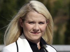 FILE - In this Sept. 13, 2018, file photo, Elizabeth Smart arrives for a news conference in Salt Lake City. Smart says she's been "reassured" the woman who helped kidnap her when she was 14 and stood by as she was sexually assaulted will be watched when she's released from prison. Appearing in an interview Tuesday, Sept. 18, on "CBS This Morning," Smart said she believes Wanda Barzee remains a danger.