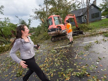 A long time resident of the area, Christy Jarvis reacts as she sees the devastation in Dunrobin as a reported tornado touched down in Dunrobin in the far west end of Ottawa.