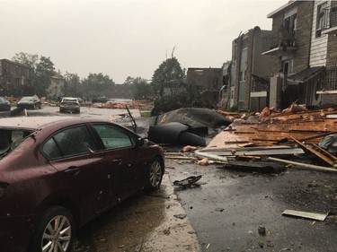 Just back from the #tornado zone in #Gatineau. This car is my sister-in-law's car. She was in it with her son when tornardos broke on Mont-Bleu. They're fine, but not everyone in those buildings with no roof are OK. 1st responders are amazing. Angels too! Denault Philippe L. 
@phldenault