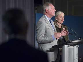 Canadian Environment Minister Catherine McKenna looks on as Paul Polman, chief executive officer of transnational consumer goods company Unilever, addresses a news conference about the Circular Economy Leadership Coalition as the G7 environment, oceans and energy ministers meet in Halifax on Thursday, Sept. 20, 2018. The group, an alliance of corporate and NGO leaders, among others, hopes to develop solutions to protect and regenerate the enviroment while enhancing prosperity.