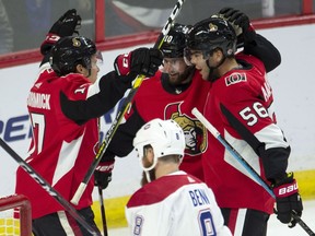 Senators winger Tom Pyatt, middle, celebrates his goal against the Canadiens on Saturday night Magnus Paajarvi, right, and Max McCormick.