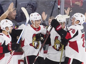 Ottawa Senators' Alex Formenton (59) celebrates with teammates after scoring against the Toronto Maple Leafs during overtime.