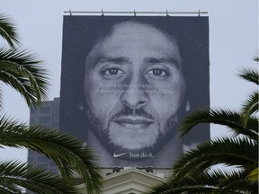 An endorsement deal between Nike and Colin Kaepernick prompted a flood of debate Tuesday as sports fans reacted to the apparel giant backing an athlete known mainly for starting a wave of protests among NFL players of police brutality, racial inequality and other social issues.