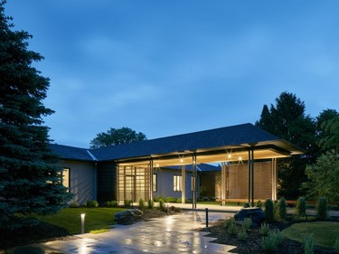 Small details, like special lighting on the upper and lower portion of the front porch, were added to the home to create a dramatic look and new experience from the daytime ambiance.