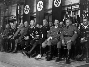 An undated picture shows German Nazi Chancellor Adolf Hitler (1rst row, 2nd R) attending a rally with high rank nazi officials including Admiral Karl Doenitz (2nd L), Chief of the German Police Heinrich Himmler (5th L), Austrian Nazi leader Arthur Seyss-Inquart and Hitler's Secretary Martin Bormann (R).