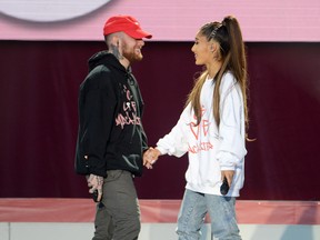 Mac Miller and Ariana Grande perform on stage on June 4, 2017 in Manchester, England.