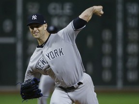 New York Yankees starting pitcher J.A. Happ delivers to the Boston Red Sox in the first inning of a baseball game at Fenway Park, Friday, Sept. 28, 2018, in Boston.