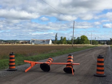 Damage after the tornado that hit Ottawa on September 21, 2018.  A road block Saturday morning September 23, 2018 off
Mohrs Rd - barn in the distance at left was demolished - hydro lines down.