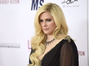 Avril Lavigne wrote candidly about her struggle with Lyme disease in an open letter to fans released Thursday.