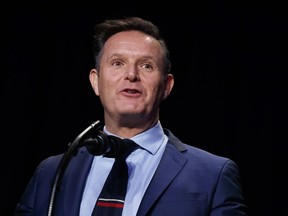 In this Feb. 2, 2017, file photo, television producer Mark Burnett introduces President Donald Trump during the National Prayer Breakfast in Washington.