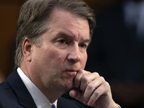 FILE - In this Sept. 6, 2018, file photo, after more than an hour of delay over procedural questions, President Donald Trump's Supreme Court nominee Brett Kavanaugh waits to testify before the Senate Judiciary Committee for the third day of his confirmation hearing, on Capitol Hill in Washington. Christine Blasey Ford, the woman accusing Kavanaugh of sexual misconduct when they were teenagers has come forward to The Washington Post.