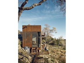 This undated photo provided by The Monacelli Press shows a hunting blind/writing studio in a house in Henley, Texas designed by Lemmo Architecture & Design. The studio's roof is a rocky fill to blend in with the surrounding terrain and is featured in the book "Texas Made/Texas Modern: the House and the Land" by Helen Thompson.