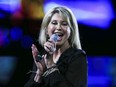 In this Feb. 23, 2017, file photo, Olivia Newton-John performs during the Viña del Mar International Song Festival at the Quinta Vergara in Viña del Mar, Chile. Newton-John said she has been diagnosed with cancer for the third time in three decades. The four-time Grammy winner, who will turn 70 on Sept. 26, told Australian news program “Sunday Night” doctors found a tumor in her lower back in 2017.