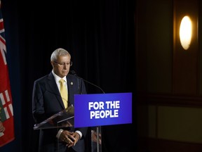 Ontario finance minister Vic Fedeli pauses during a press conference after addressing the Economic Club of Canada in Toronto on Friday, Sept. 21, 2018.