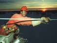 A hydro worker strings line up near Kemptville after the 1998 ice storm.