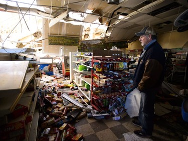 Mike Fines who is part owner of Dunrobin Meets and Deli surveys the damage to the store caused by a tornado in Dunrobin, Ont., west of Ottawa, on Monday, Sept. 24, 2018. The tornado that hit the area was on Friday, Sept, 21.