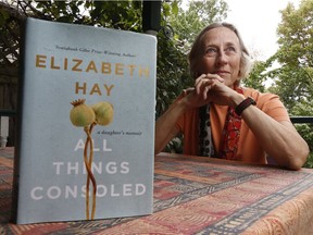 Award-winning Ottawa author Elizabeth Hay poses for a photo with her new book at her home in Ottawa Wednesday Sept 26, 2018.   Tony Caldwell