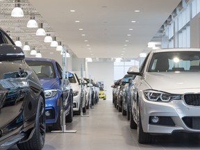 A parade of 16 gleaming new BMW models forms two impressive lines down the middle of Otto BMW's bright, expansive showroom floor.