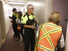 Ottawa Public Health and Ottawa Search and Rescue were checking on seniors as they were going through a building on Viewmount Drive in Ottawa Monday Sept 24, 2018.