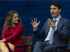 Foreign Affairs Minister Chrystia Freeland looks on as Canadian Prime Minister Justin Trudeau responds to a question during a panel discussion at the Council on Foreign Relations in New York, Tuesday, Sept. 25, 2018.