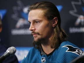 Newly acquired San Jose Sharks defenseman Erik Karlsson speaks to the media during a news conference in San Jose, Calif., Wednesday, Sept. 19, 2018.